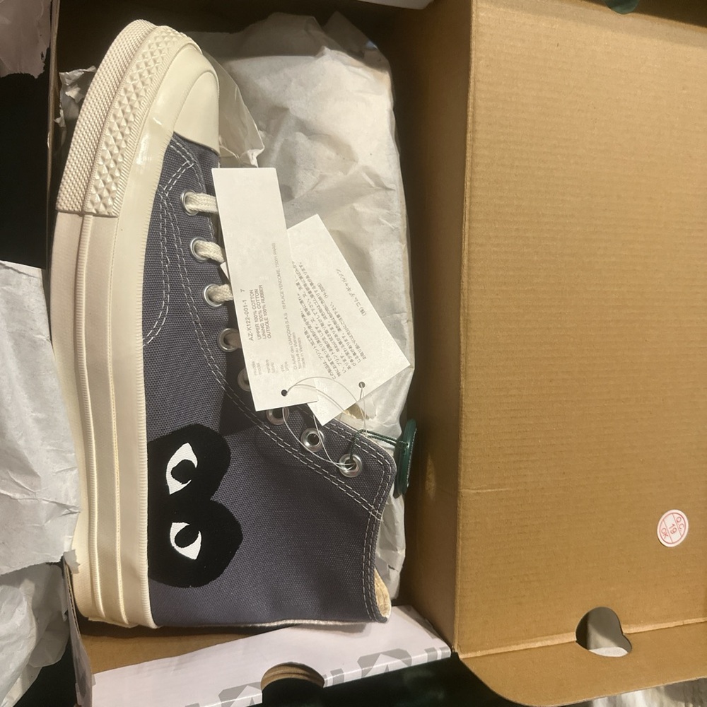 Comme des Garcons Gray and White Sneakers Stylish Design